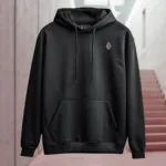 Front view of black pullover hoodie featuring a fallen knight sitting still, sword plunged into the ground, with a visibly large hole in his armor