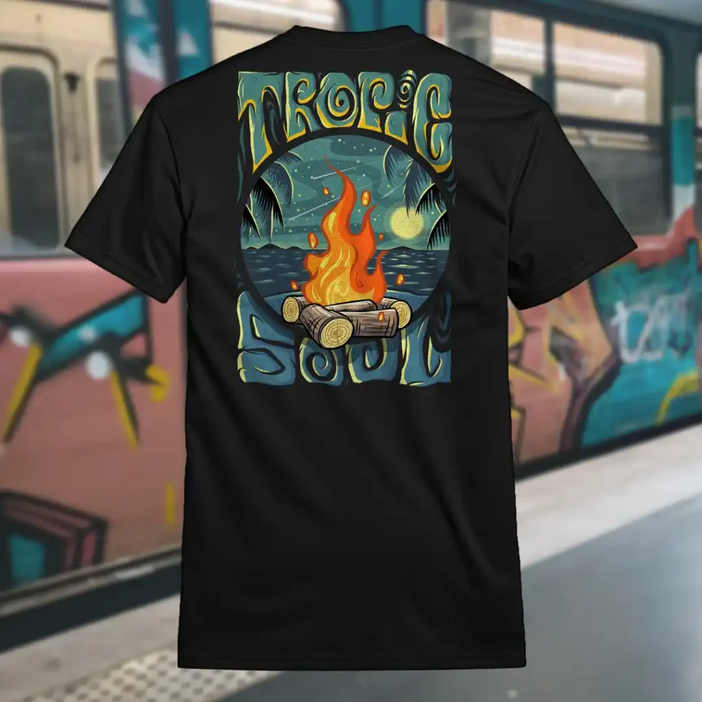 Back view of black Tropic Soul tshirt displaying the Moon Fire and night sky over the sea rear graphic placement.