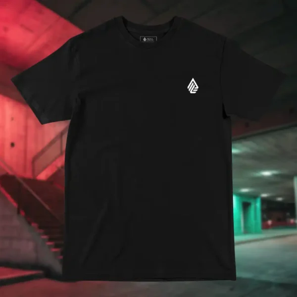 Front view of black shirt featuring a demonic red being, several hands floating and holding different signs with a single heart beating, the pentagram behind silent