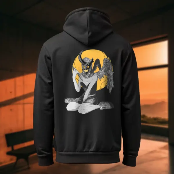 Back view of black Manifesto hoodie displaying a winged horned woman sat down, holding a dagger with an evil grin rear graphic placement and hood detail.