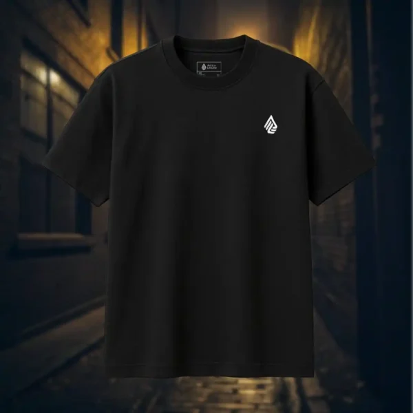 Front view of black pullover shirt featuring a winged horned woman sat down, holding a dagger with an evil grin