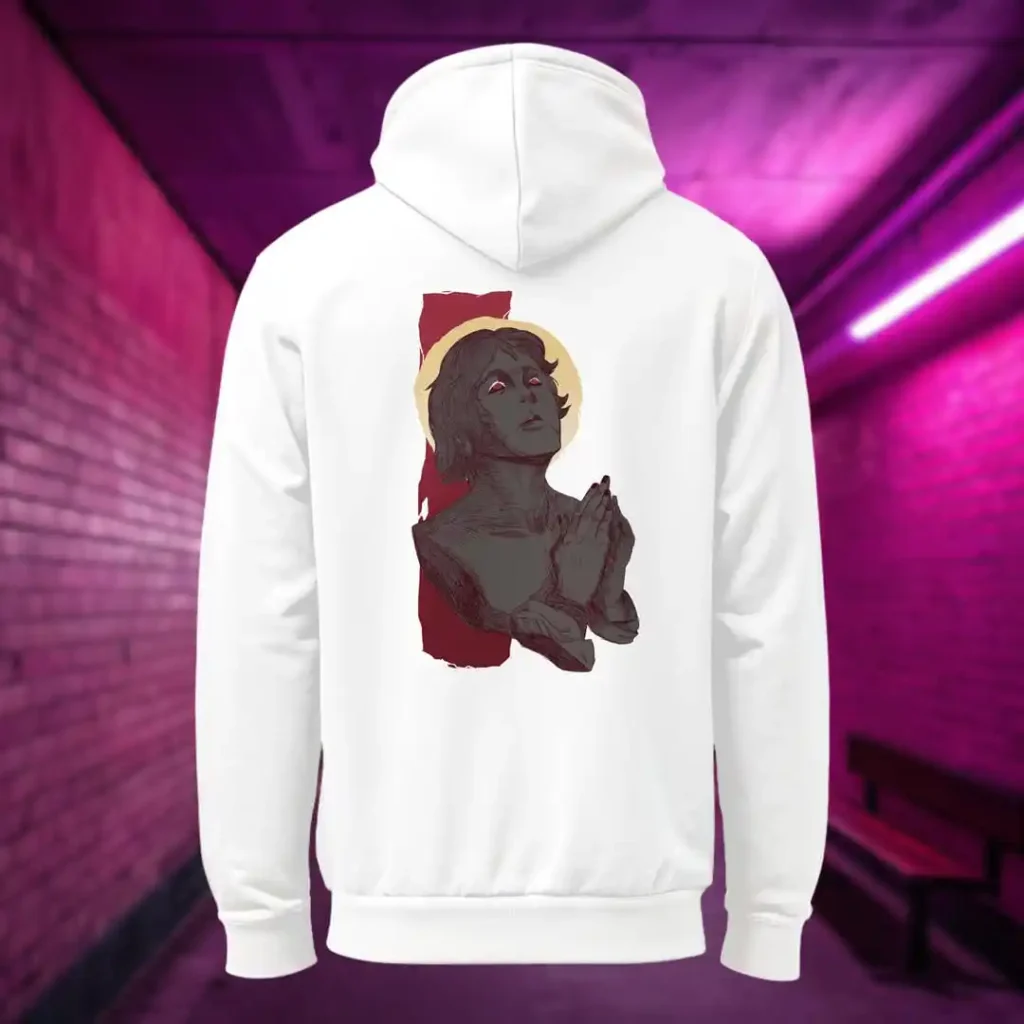 Back view of white Manifesto hoodie displaying a man who seems like a statue, hands in a praying position, eyes staring at the skies above rear graphic placement and hood detail