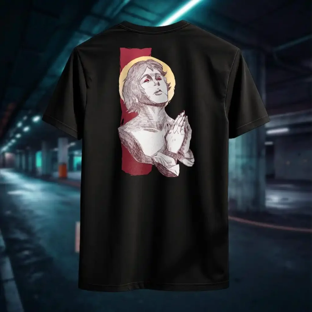 Back view of black Manifesto tshirt displaying a man who seems like a statue, hands in a praying position, eyes staring at the skies above rear graphic placement