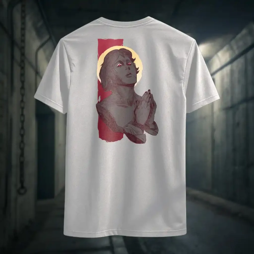 Back view of white Manifesto tshirt displaying a man who seems like a statue, hands in a praying position, eyes staring at the skies above rear graphic placement