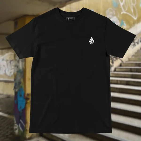 Front view of black tshirt featuring the Flip Me skateboard and beach graphic.