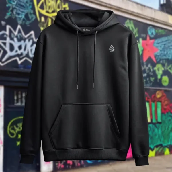 Front view of black pullover hoodie featuring a man relaxing on a hammock tied to the Skull Island's palm trees next to a giant wave graphic.