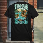 Back view of black Tropic Soul tshirt displaying the Secret Skull, treasures, animals and waves rear graphic placement.