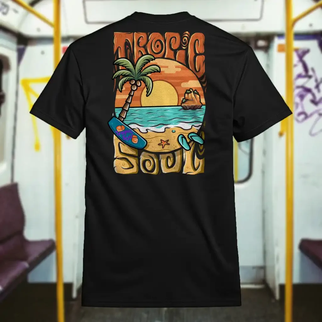 Back view of black Tropic Soul tshirt displaying the Sandset beach and waves rear graphic placement.