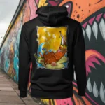 Back view of black Easy Days hoodie displaying a roasted pig skewered by a bamboo stick, lying underneath an umbrella taking cover from the sun rear graphic placement and hood detail.