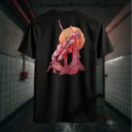 Back view of black Manifesto tshirt displaying a man falling back as he's impaled by a spear rear graphic placement