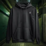 Front view of black pullover hoodie featuring a warrior with eyes in his wings, a sword piercing through his head.