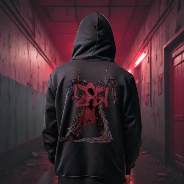 A male model with his back turned wearing a black Manifesto hoodie featuring a red winged creature of dark, visibly hanged by ropes, opening its stomach with its unseen face